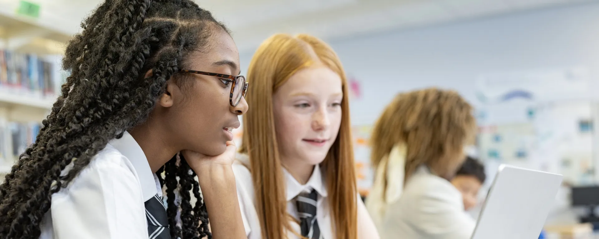 High school students studying in the school library