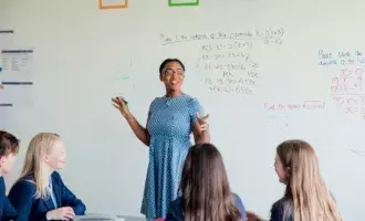Education - Teacher in the classroom with students