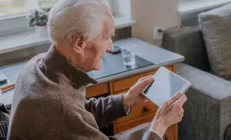 Older person with tech