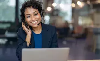 Woman at call center desktop
